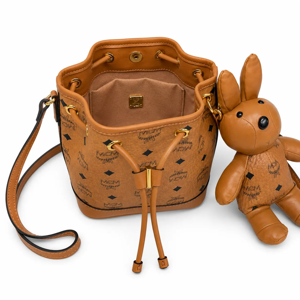 MCM Dessau Bucket Bag Visetos | Cognac Monogram Drawstring Crossbody Leather — Dry Cognac