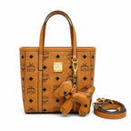 MCM Toni Visetos Mini Shopper Bag | Cognac Monogram Leather Crossbody Tote — Dry Cognac