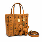 MCM Toni Visetos Mini Shopper Bag | Cognac Monogram Leather Crossbody Tote — Dry Cognac