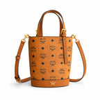 MCM Aren Visetos Mini Bucket Bag | Cognac Monogram Leather Tote — Dry Cognac
