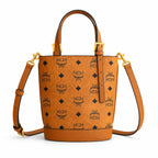 MCM Aren Visetos Mini Bucket Bag | Cognac Monogram Leather Tote — Dry Cognac
