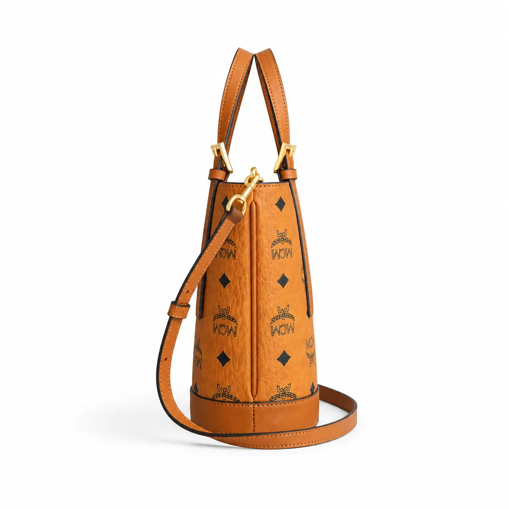 MCM Aren Visetos Mini Bucket Bag | Cognac Monogram Leather Tote — Dry Cognac
