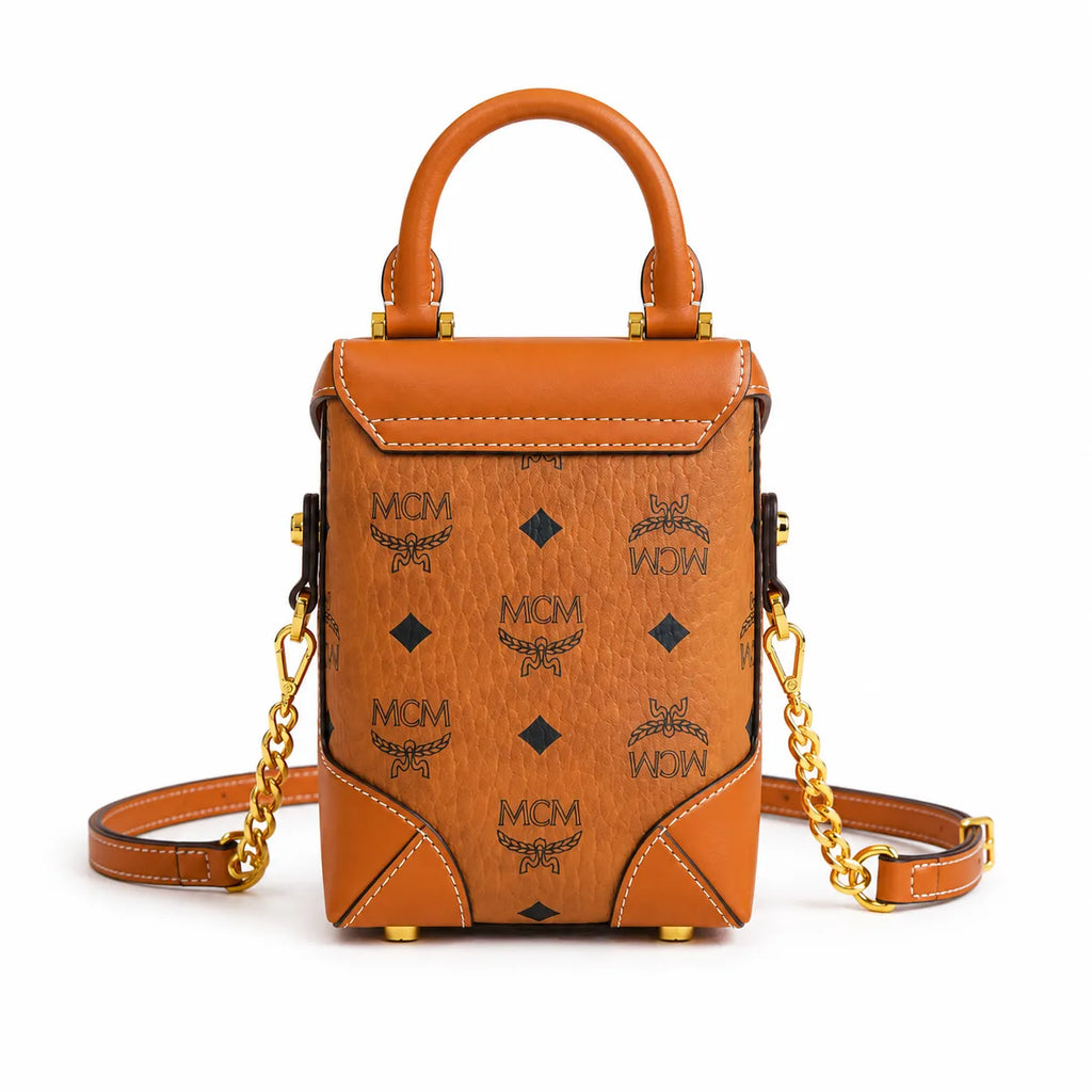 MCM Patricia Visetos Mini Backpack | Cognac Monogram Chain Shoulder Bag — Dry Cognac