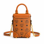 MCM Patricia Visetos Mini Backpack | Cognac Monogram Chain Shoulder Bag — Dry Cognac