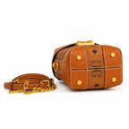MCM Patricia Visetos Mini Backpack | Cognac Monogram Chain Shoulder Bag — Dry Cognac