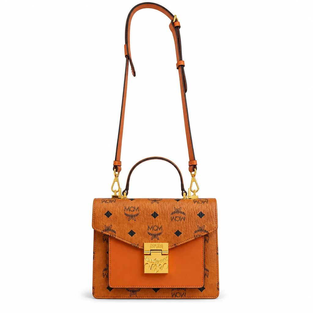 MCM Patricia Visetos Flap Bag | Cognac Monogram Leather Messenger Satchel — Dry Cognac