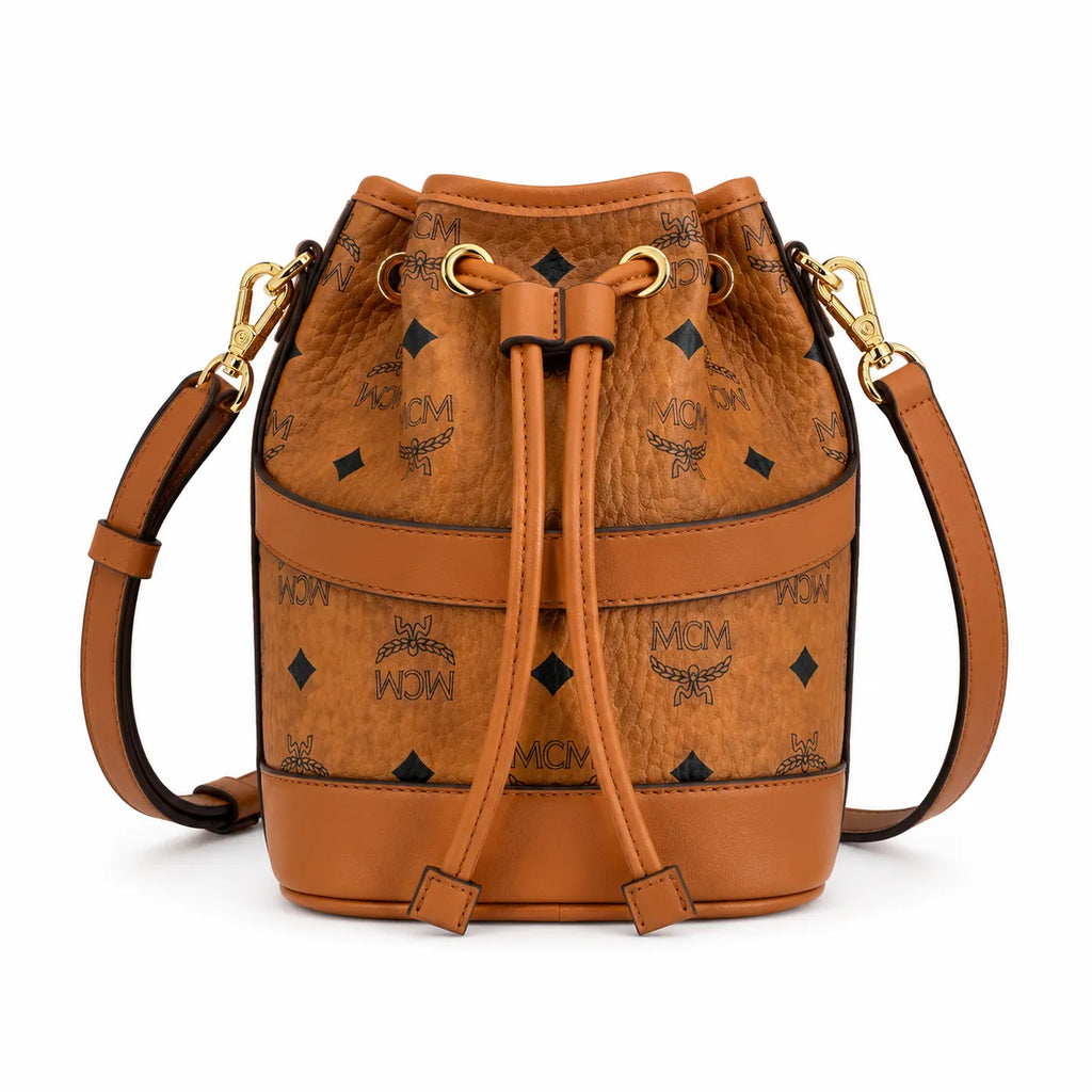 MCM Dessau Visetos Bucket Bag Mini | Drawstring Crossbody Shoulder Bag in Cognac — Designer Coated Canvas & Leather Handbag