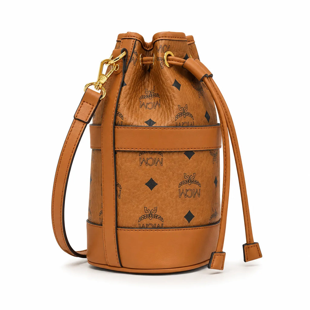 MCM Dessau Visetos Bucket Bag Mini | Drawstring Crossbody Shoulder Bag in Cognac — Designer Coated Canvas & Leather Handbag