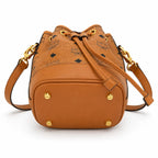 MCM Dessau Visetos Bucket Bag Mini | Drawstring Crossbody Shoulder Bag in Cognac — Designer Coated Canvas & Leather Handbag