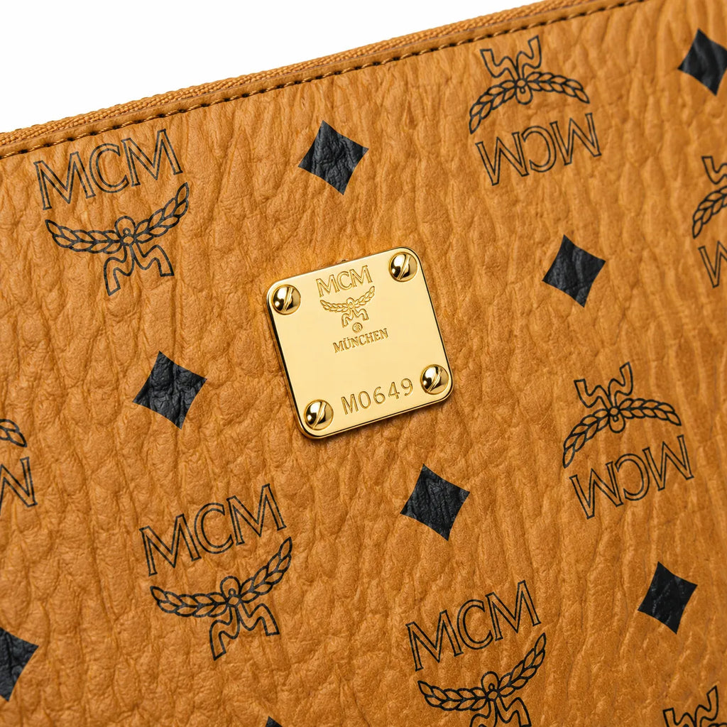MCM Visetos Classic Large Zip Pouch | A4 Flat Clutch Bag in Cognac — Designer Monogram Makeup Pouch & Travel Organizer for Women