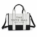 Marc Jacobs The Tote Bag Small Black & White Colorblock Pebble Leather Top-Handle Crossbody Bag with Embossed Logo
