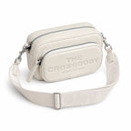 Marc Jacobs The Crossbody Mini Cream Pebble Leather Dual-Zip Crossbody Bag with Embossed Logo