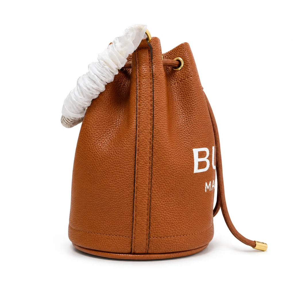 Marc Jacobs The Bucket Small Brown Pebbled Leather Bucket Bag with White Logo Print & Detachable Strap