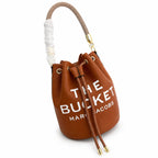Marc Jacobs The Bucket Small Brown Pebbled Leather Bucket Bag with White Logo Print & Detachable Strap