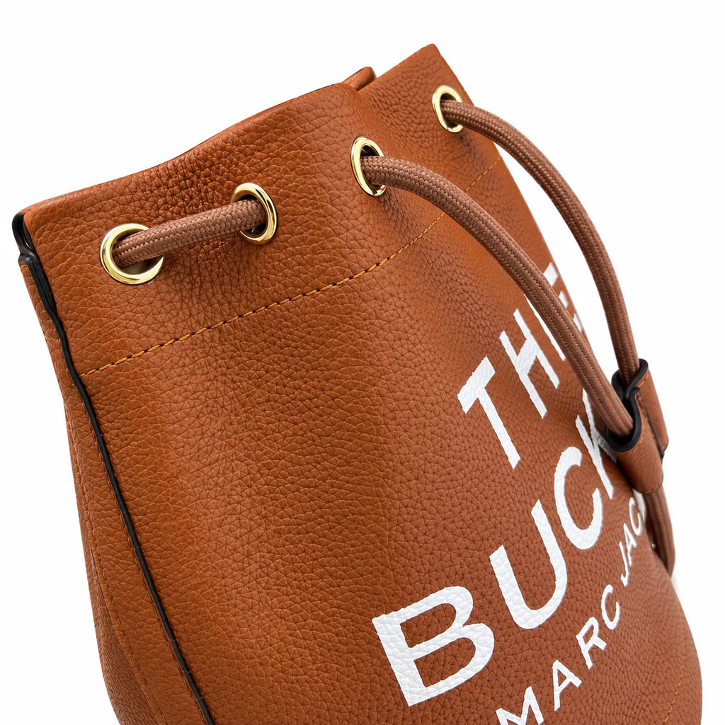 Marc Jacobs The Bucket Small Brown Pebbled Leather Bucket Bag with White Logo Print & Detachable Strap