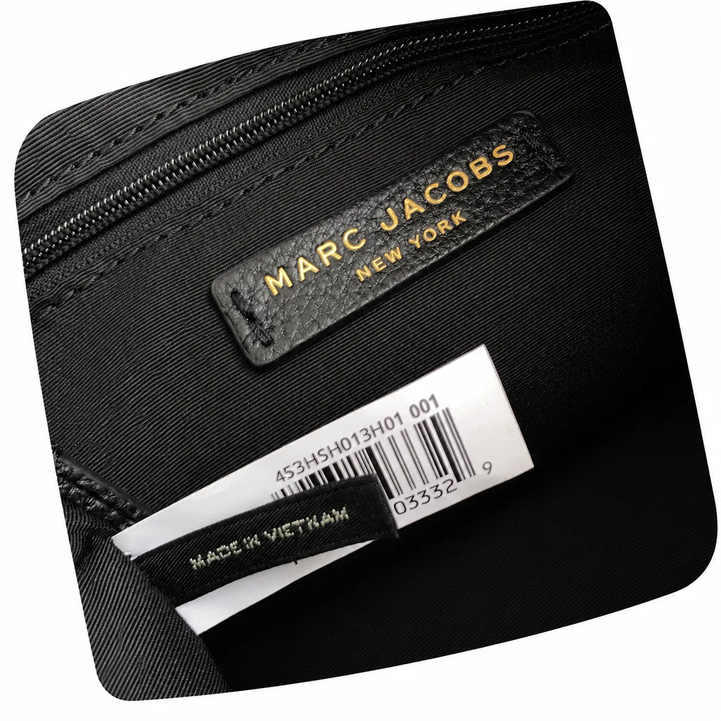 Marc Jacobs black pebbled leather | Classic tote bag style  large capacity  can be worn crossbody or carried by hand