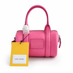 Marc Jacobs | Bright pink pebbled leather signature logo adjustable shoulder strap women's designer mini leather travel bag
