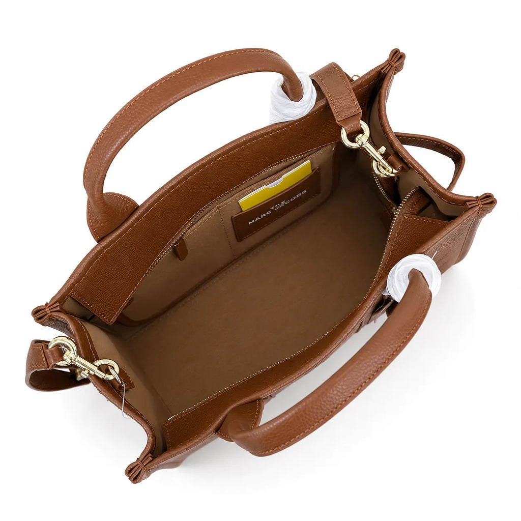 Marc Jacobs | Brown pebbled leather embossed logo  detachable shoulder strap  women's commuter handbag