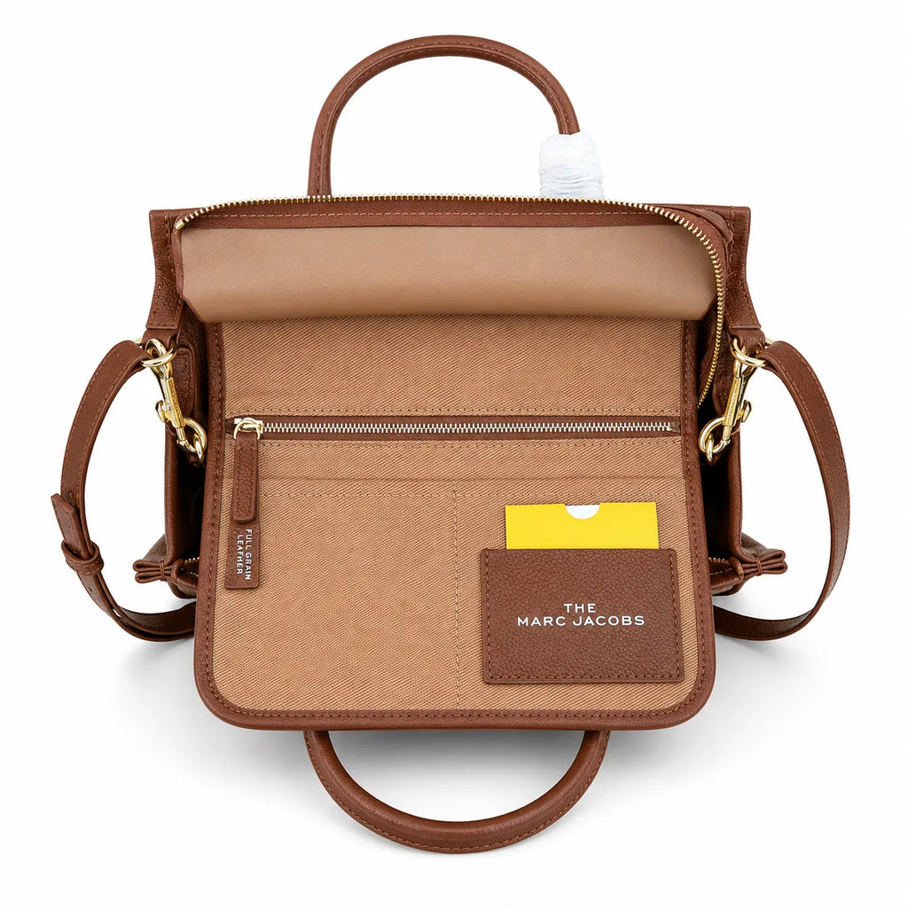 Marc Jacobs | Brown pebbled leather embossed logo  detachable shoulder strap  women's commuter handbag