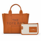 Marc Jacobs | Brown pebbled leather embossed logo detachable shoulder strap women's commuter handbag