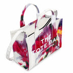 Marc Jacobs Medium Future Floral | White base with vibrant floral print  embossed logo detachable shoulder strap  women's commuter tote bag