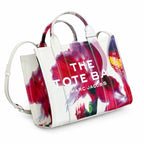 Marc Jacobs Medium Future Floral | White base with vibrant floral print  embossed logo detachable shoulder strap  women's commuter tote bag