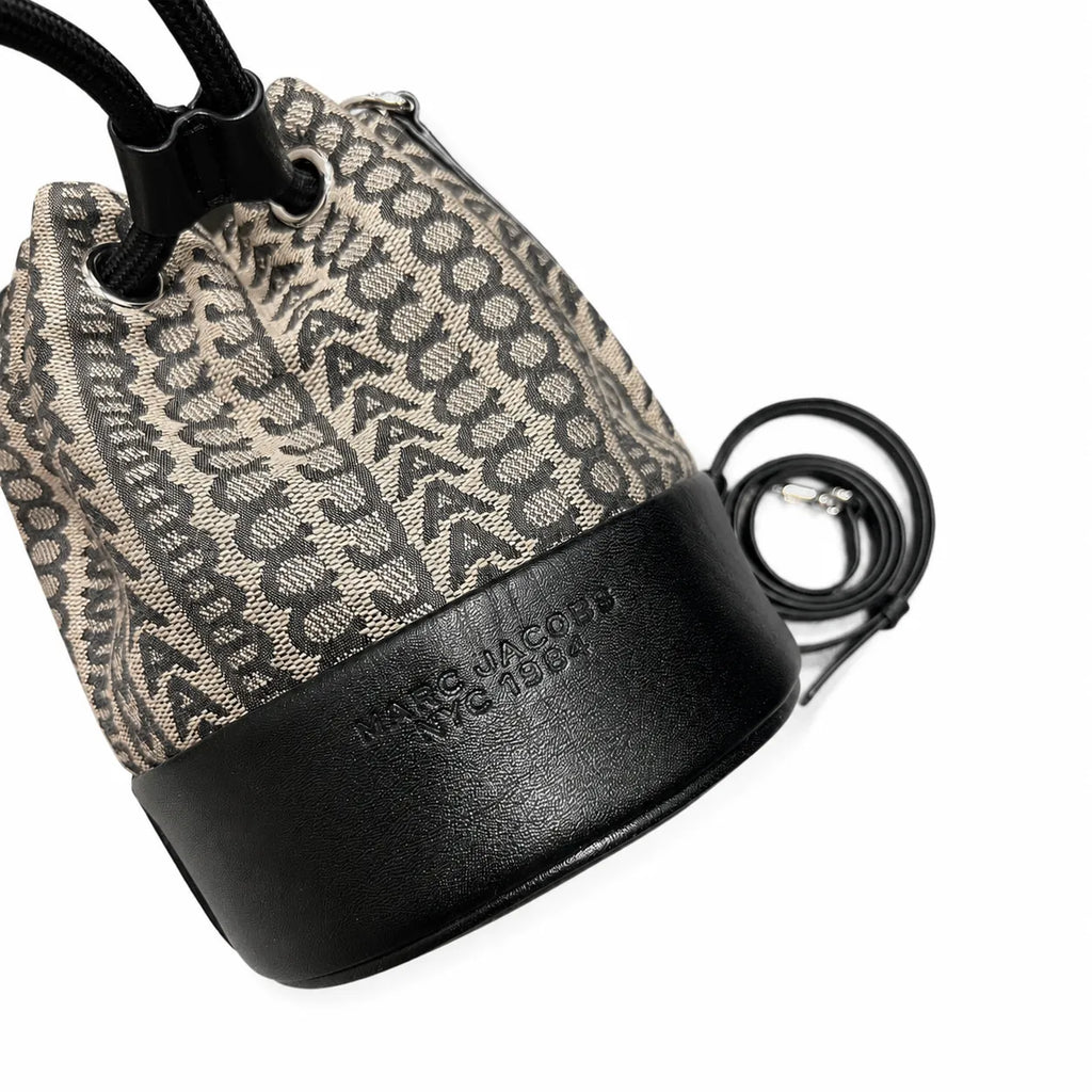 Marc Jacobs Monogram | Beige and black jacquard fabric  leather trim drawstring closure detachable shoulder strap  women's designer mini bucket bag