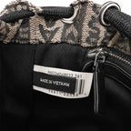 Marc Jacobs Monogram | Beige and black jacquard fabric  leather trim drawstring closure detachable shoulder strap  women's designer mini bucket bag