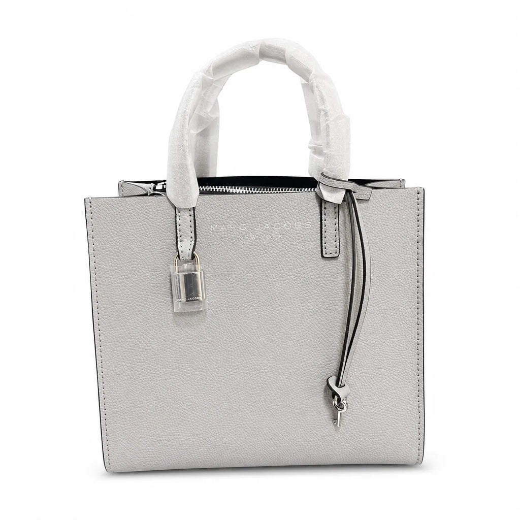 Marc Jacobs The Mini Grind | Light grey pebbled leather  embossed logo  detachable shoulder strap  women's commuter handbag