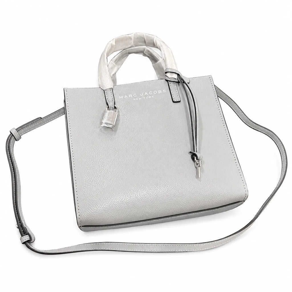 Marc Jacobs The Mini Grind | Light grey pebbled leather  embossed logo  detachable shoulder strap  women's commuter handbag