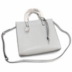 Marc Jacobs The Mini Grind | Light grey pebbled leather  embossed logo  detachable shoulder strap  women's commuter handbag