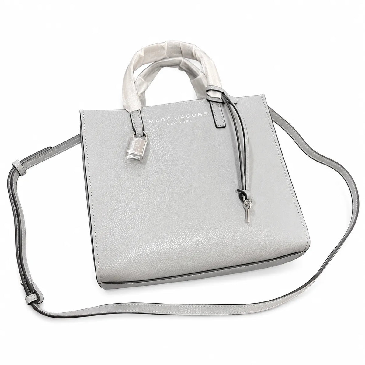 Marc Jacobs The Mini Grind | Light grey pebbled leather  embossed logo  detachable shoulder strap  women's commuter handbag