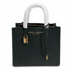 Marc Jacobs The Mini Grind | Light grey pebbled leather  embossed logo  detachable shoulder strap  women's commuter handbag