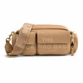 Marc Jacobs Cargo | Nude pebbled leather adjustable shoulder strap  embossed logo women's designer crossbody bag