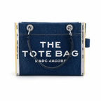 Marc Jacobs | Dark washed denim  silver chain shoulder strap  embossed logo  women's designer denim chain mini tote bag