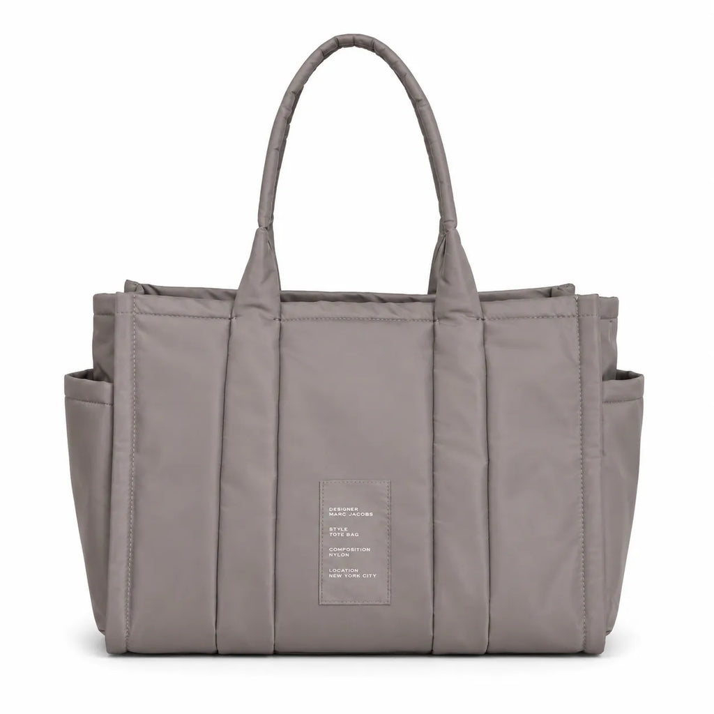 Marc Jacobs | Grey quilted nylon  embossed logo  double handles  exterior pocket  women's commuter tote bag