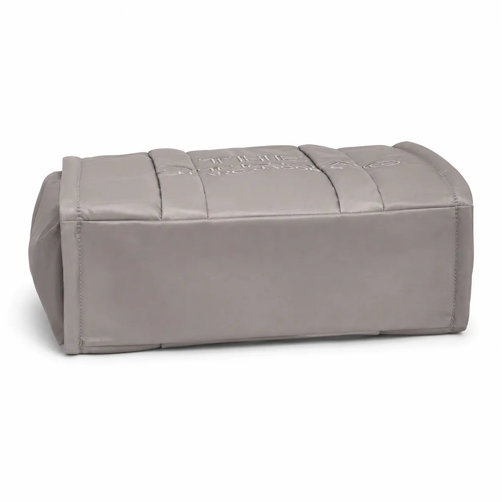 Marc Jacobs | Grey quilted nylon  embossed logo  double handles  exterior pocket  women's commuter tote bag
