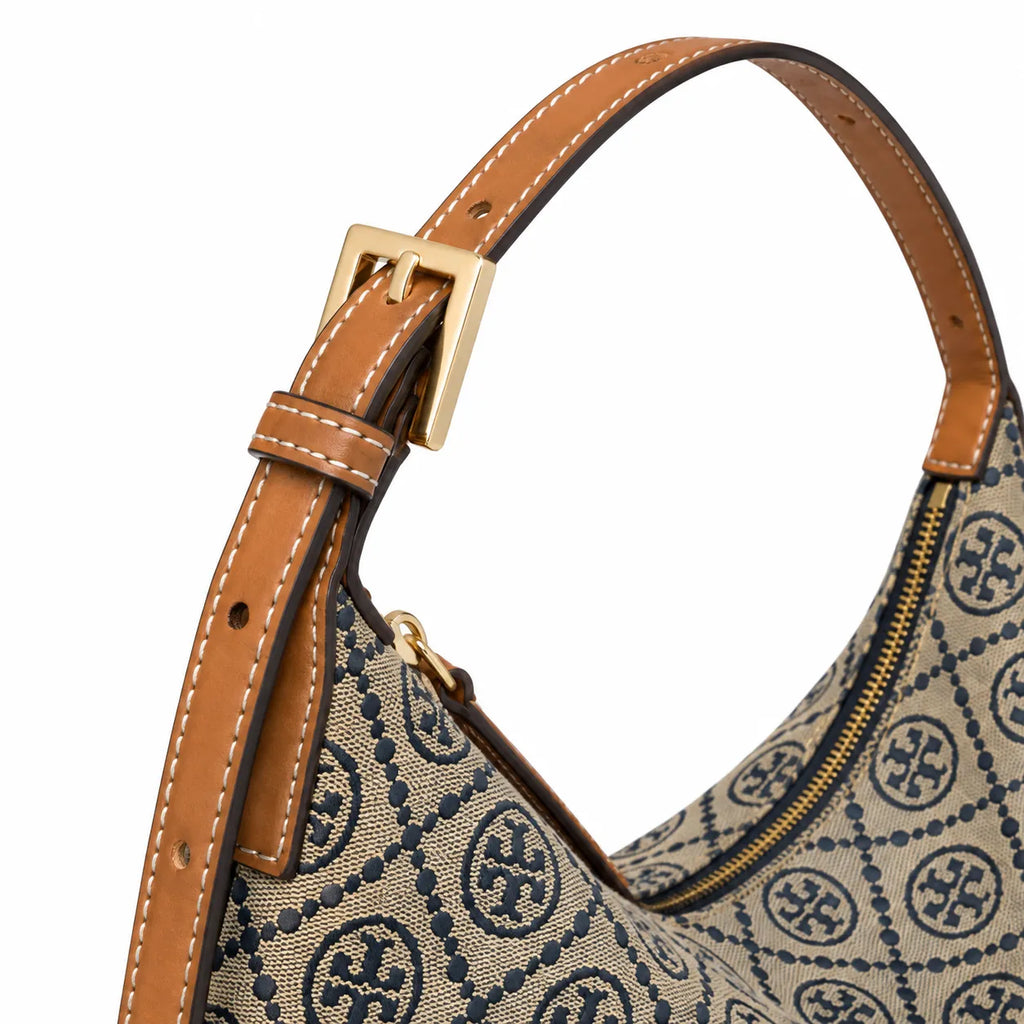 Tory Burch T Monogram Crescent | Beige jacquard fabric with navy blue logo  brown leather trim  adjustable shoulder strap women's designer shoulder bag