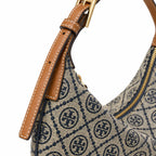 Tory Burch T Monogram Crescent | Beige jacquard fabric with navy blue logo  brown leather trim  adjustable shoulder strap women's designer shoulder bag