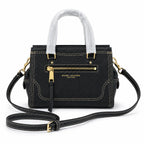 Marc Jacobs Mini Cruiser | Black pebbled leather  detachable shoulder strap  embossed logo  women's designer handbag