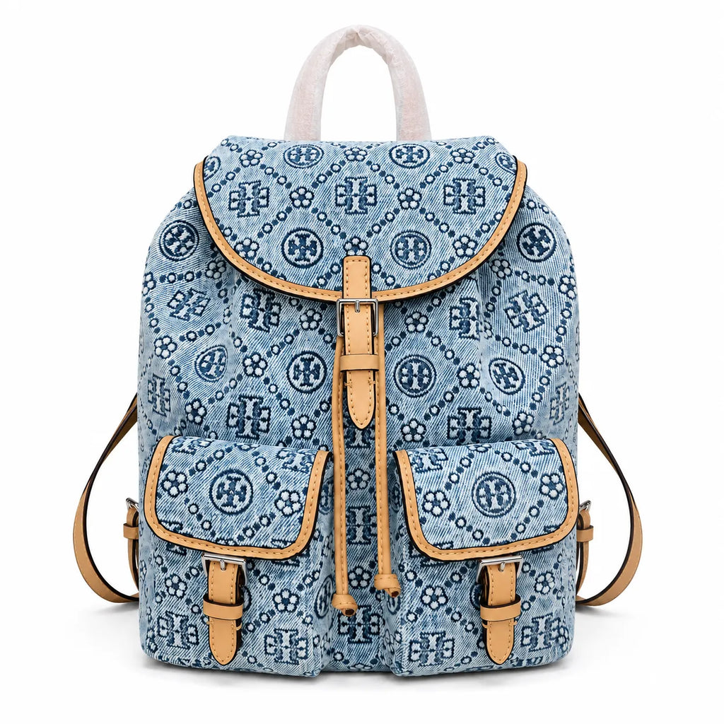 Tory Burch T Monogram | Light blue washed denim and navy logo  tan leather trim adjustable shoulder strap  women's designer shoulder bag