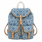 Tory Burch T Monogram | Light blue washed denim and navy logo  tan leather trim adjustable shoulder strap  women's designer shoulder bag