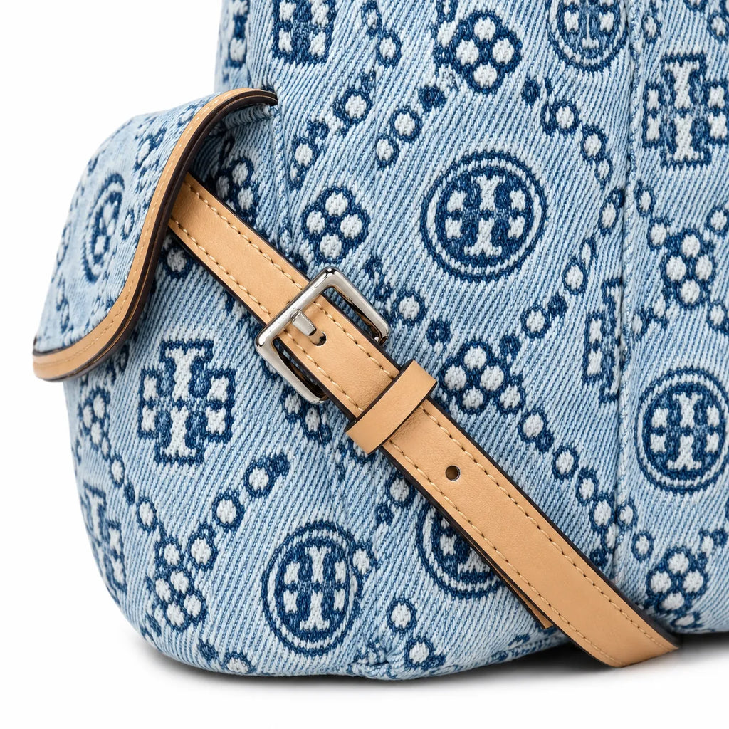 Tory Burch T Monogram | Light blue washed denim and navy logo  tan leather trim adjustable shoulder strap  women's designer shoulder bag