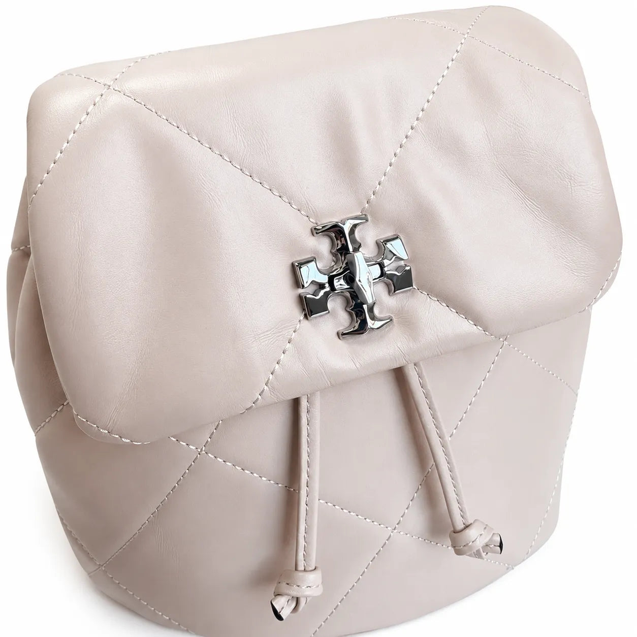 Tory Burch Kira Mini Quilted Bag | Soft pink leather with a silver double T logo  featuring an adjustable chain leather shoulder strap  a women's designer backpack