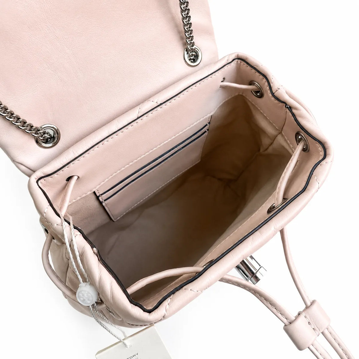 Tory Burch Kira Mini Quilted Bag | Soft pink leather with a silver double T logo  featuring an adjustable chain leather shoulder strap  a women's designer backpack