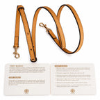 Tory Burch Romy | Caramel-colored pebbled leather with a detachable shoulder strap and double T charm  women's designer small crossbody bag