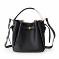 Tory Burch Romy | Black pebbled leather with adjustable shoulder strap and drawstring closure  women's designer shoulder bag
