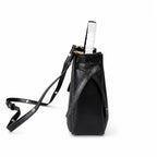 Tory Burch Romy | Black pebbled leather with adjustable shoulder strap and drawstring closure  women's designer shoulder bag