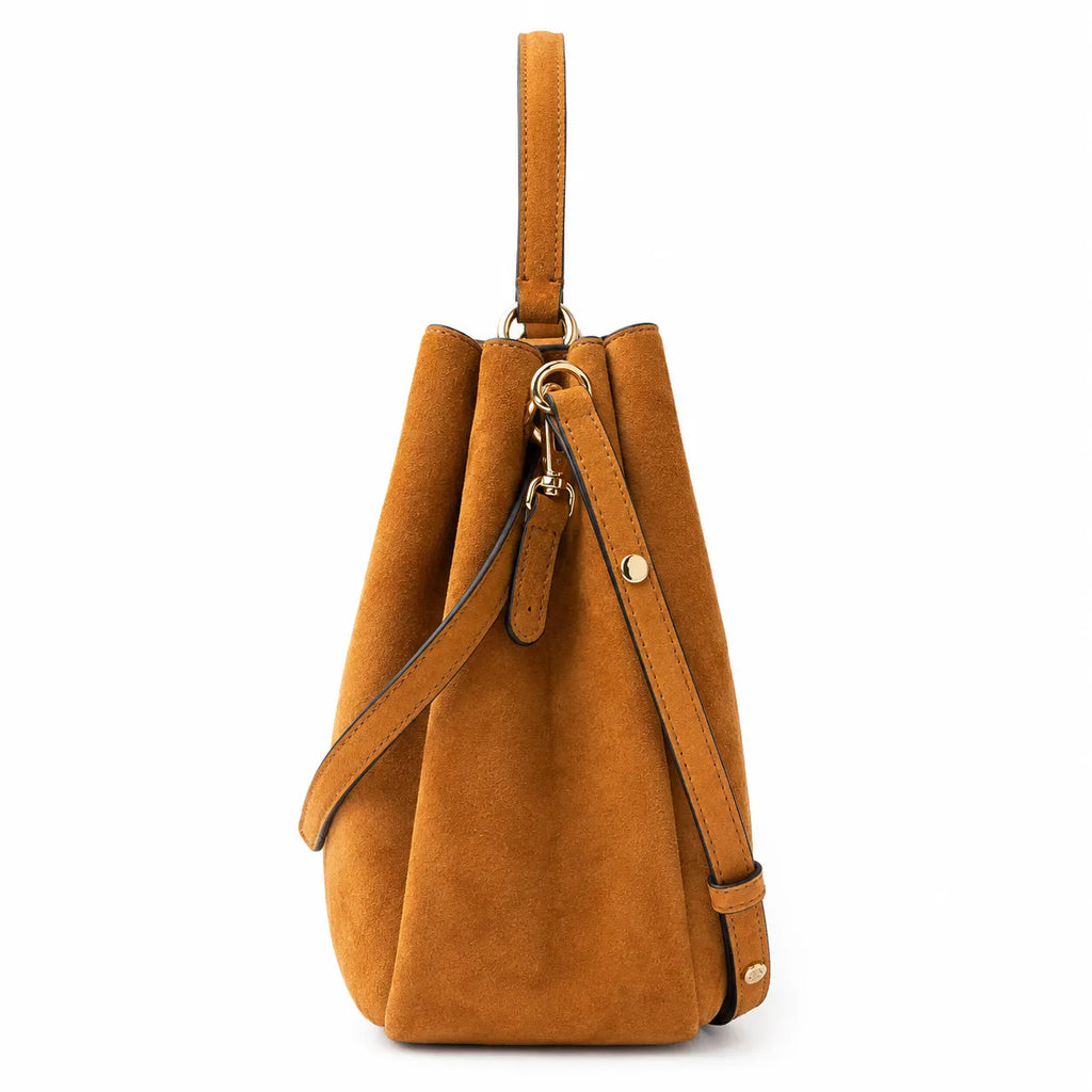 Tory Burch Romy | Caramel brown with adjustable shoulder strap and drawstring closure  women's designer suede bucket bag