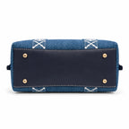 Tory Burch Perry | Blue washed denim  white embroidered T-logo stripes  navy leather trim and gold charm  double handles and adjustable shoulder strap  women's designer shoulder bag